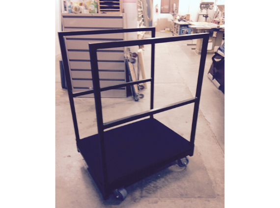 finished custom move cart with rails on the sidesto hold screens, panels, white boards, etc