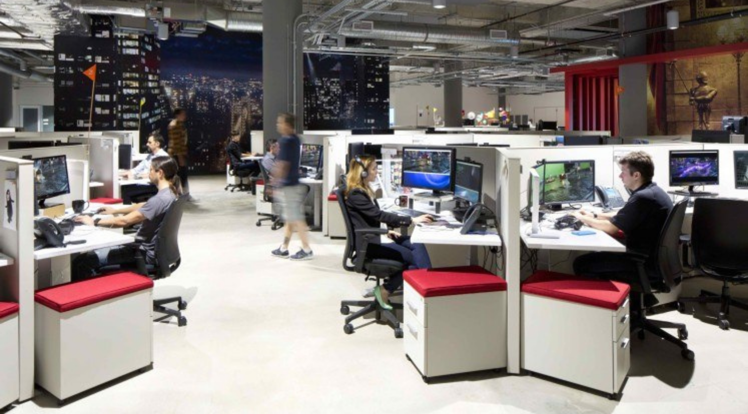 workstations with 180 degree desks and pedestal storage with red cushion tops