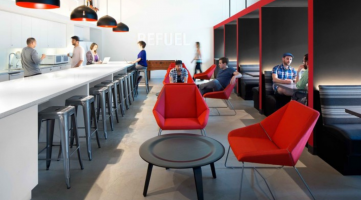 cafe space with red lounge chairs, bar seating and booth seating