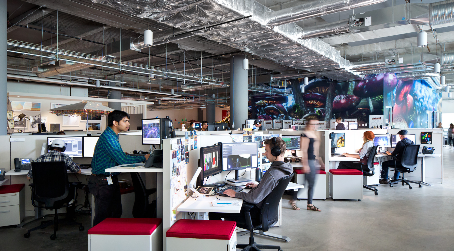 workstations with 180 degree desks and pedestal storage with red cushion tops